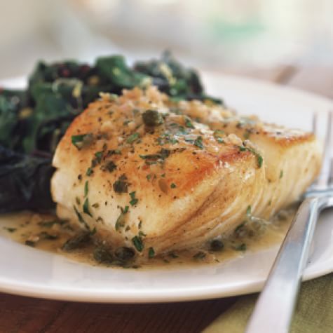 Baked sea bass with caper and pepper sauce