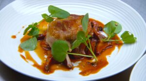 Confit of duck with mushrooms
