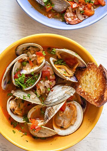 Wood-Roasted Clams with Saffon, Tomato, Garlic and Grilled Bread